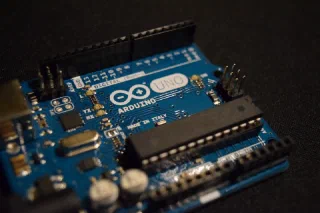 Arduino: How to integrate multiple sketches with Standard Firmata